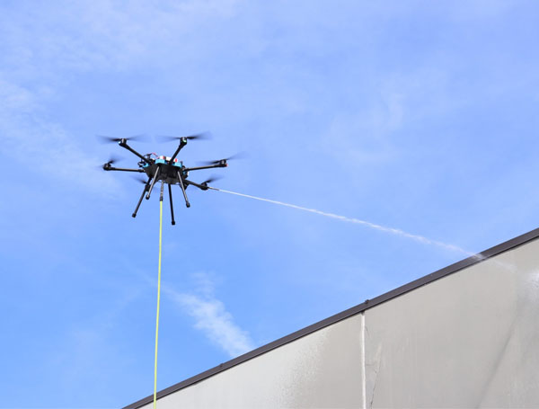 Drone Pressure Washing for Long Beach Commercial Properties: HOA & Mid-Rise Rules